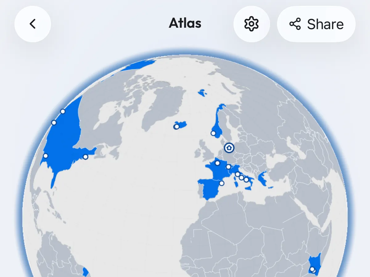 Atlas showing the countries a photographer has visited, colored on a globe